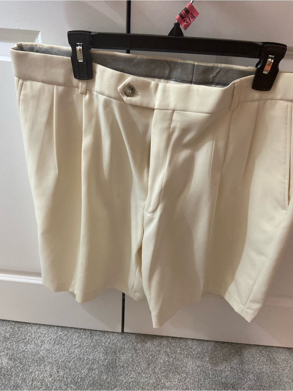 Neiman Marcus cream tailored shorts. New without tags.